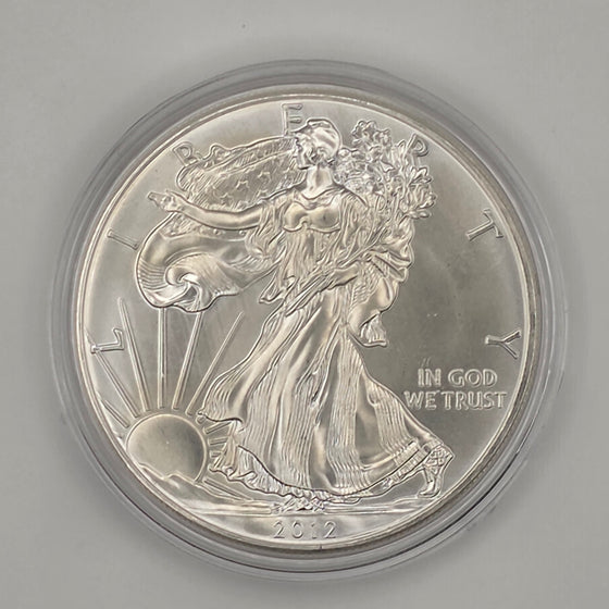 2012 American Silver Eagle (w/ Toning and Protective Capsule) — 1 oz .999 Fine Silver