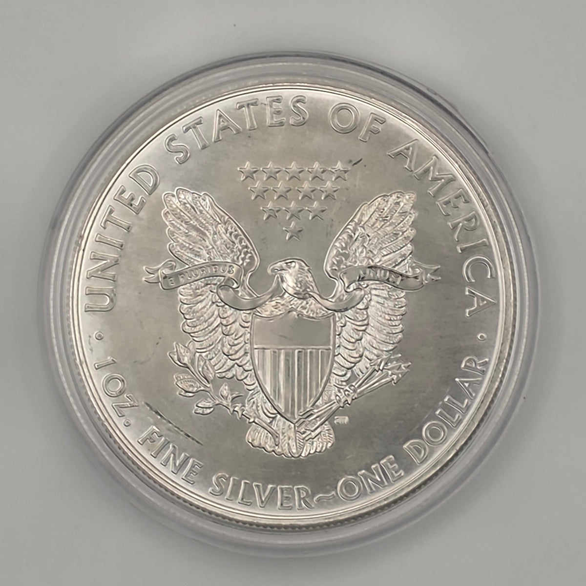 2012 American Silver Eagle (w/ Toning and Protective Capsule) — 1 oz .999 Fine Silver