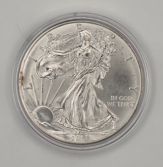 2013 American Silver Eagle (w/ Toning and Protective Capsule) — 1 oz .999 Fine Silver
