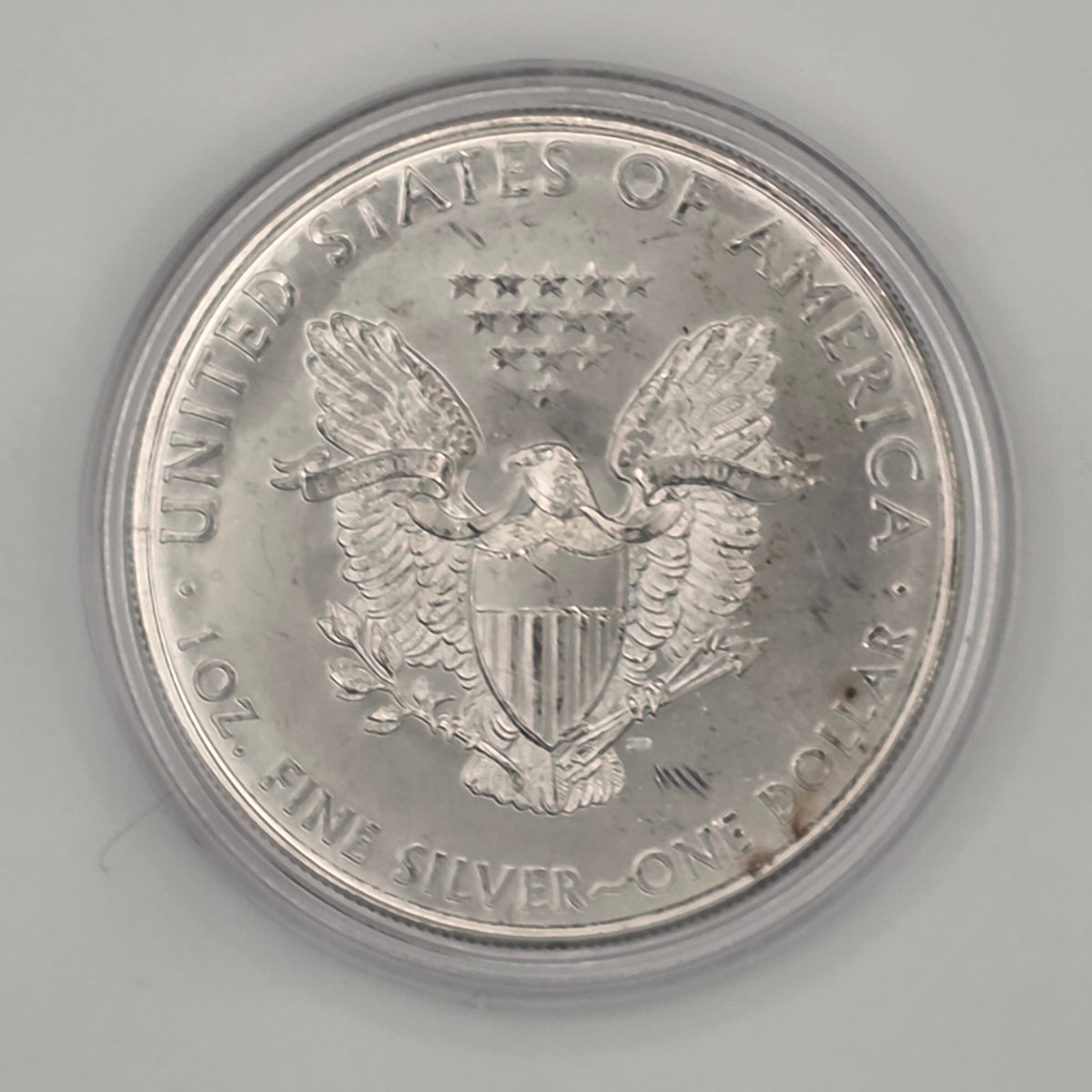 2013 American Silver Eagle (w/ Toning and Protective Capsule) — 1 oz .999 Fine Silver