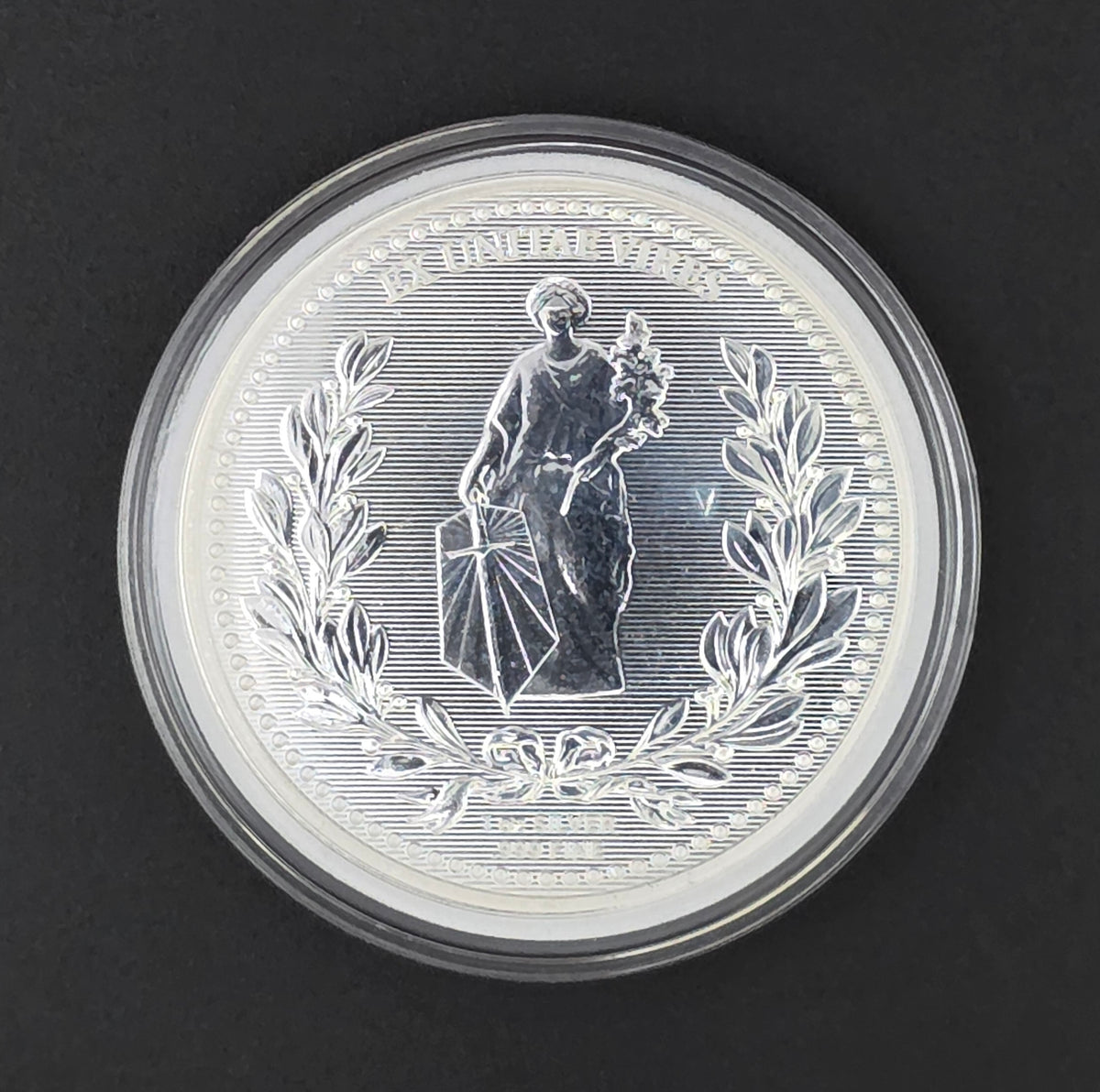 John Wick Continental Round - 1oz .999 Fine Silver